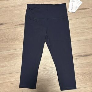 Athleta ultra high rise elevation capri, size small navy